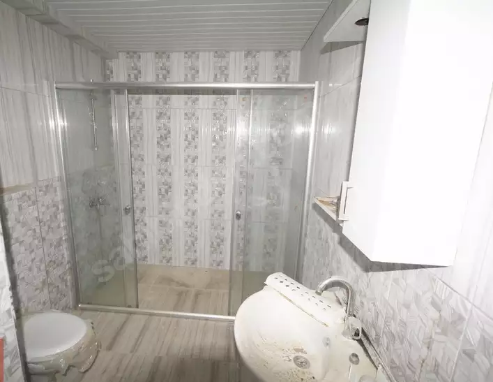 Доступное (1+1) жилье в самом интернациональном районе Алании - В МАХМУТЛАРЕ.