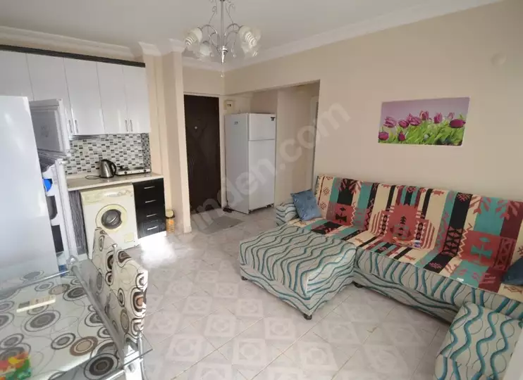 Доступное (1+1) жилье в самом интернациональном районе Алании - В МАХМУТЛАРЕ.