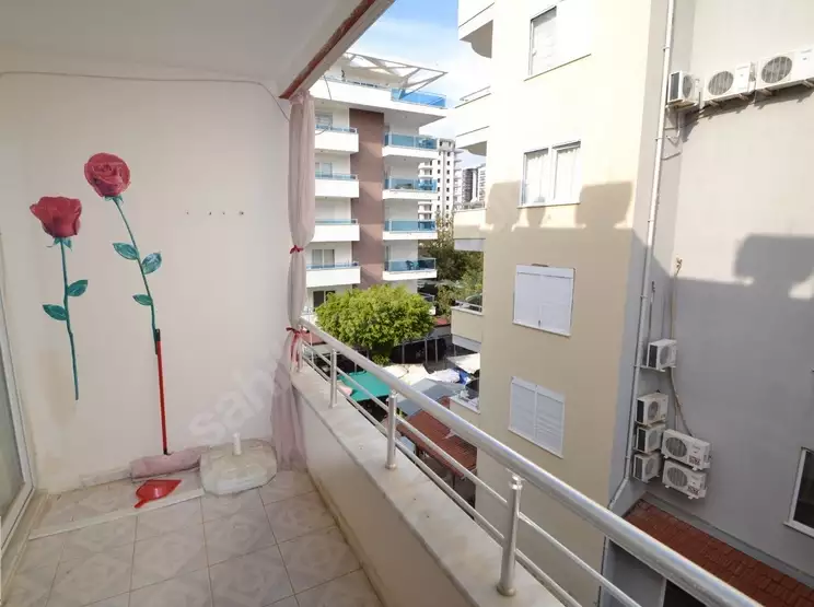 Доступное (1+1) жилье в самом интернациональном районе Алании - В МАХМУТЛАРЕ.