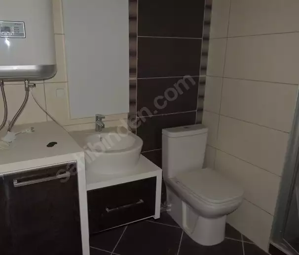 Доступное (1+1) жилье в самом интернациональном районе Алании - В МАХМУТЛАРЕ.