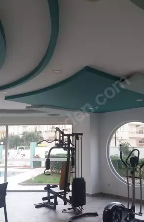 Доступное (1+1) жилье в самом интернациональном районе Алании - В МАХМУТЛАРЕ.