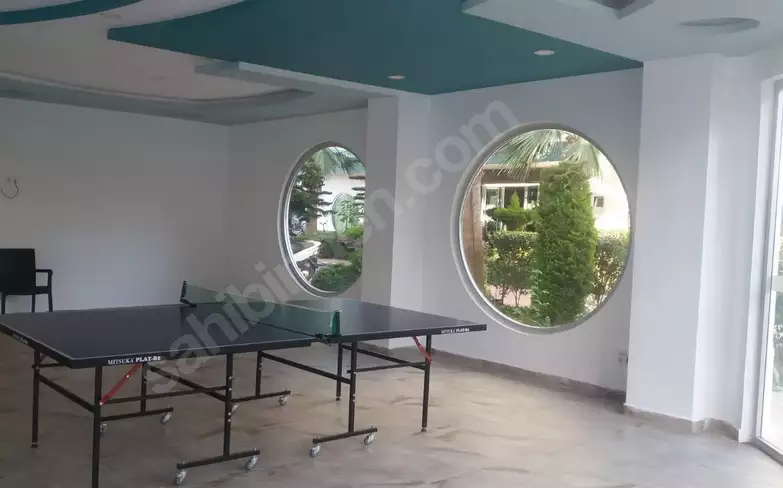 Доступное (1+1) жилье в самом интернациональном районе Алании - В МАХМУТЛАРЕ.