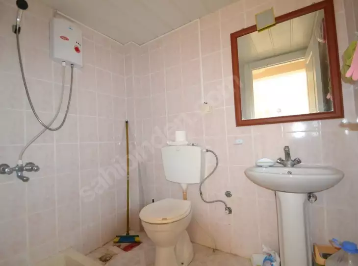 Доступное (1+1) жилье в самом интернациональном районе Алании - В МАХМУТЛАРЕ.