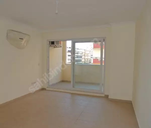 Доступное (1+1) жилье в самом интернациональном районе Алании - В МАХМУТЛАРЕ.