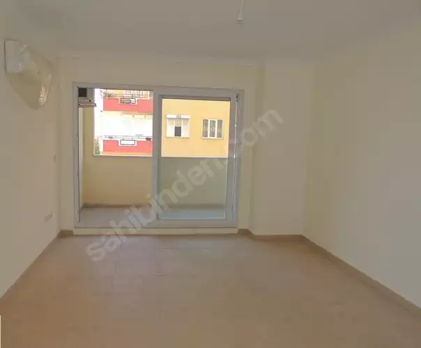 Доступное (1+1) жилье в самом интернациональном районе Алании - В МАХМУТЛАРЕ.