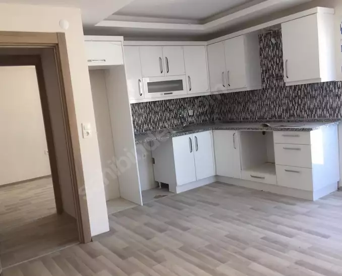 Доступные квартиры (2+1) в Гюмюльдур \ Измир.